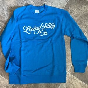 Brand new never worn Living Fully Co sweatshirt